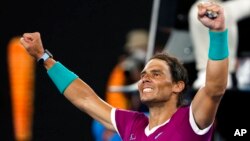 Rafael Nadal of Spain celebrates after defeating Matteo Berrettini of Italy in their semifinal match at the Australian Open tennis championships in Melbourne, Australia, Jan. 28, 2022.