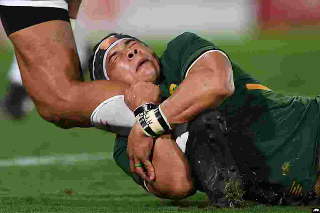 South Africa's Cheslin Kolbe tackles Japan's Ataata Moeakiola during the friendly rugby match between Japan and South Africa at the Kumagaya Rugby Stadium in Kumagaya, Japan, Sept. 6, 2019.