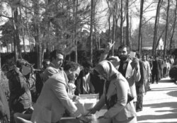 Iranians vote in a March 30-31, 1979, referendum asking whether or not Iran should become an 'Islamic republic,' with no other alternatives offered. (Courtesy Mehr News)
