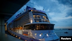 Royal Caribbean's Quantum of the Seas cruise ship is moored at Marina Bay Cruise Center after a passenger tested positive for coronavirus disease (COVID-19) during a cruise to nowhere, in Singapore, Dec. 9, 2020. 