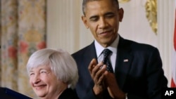 FILE - President Barack Obama applauds as Janet Yellen, vice chair of the Board of Governors of the Federal Reserve System, speaks after the president announced he is nominating Yellen to be chair of the Federal Reserve, succeeding Ben Bernanke, in the St