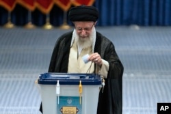 Iranian Supreme Leader Ayatollah Ali Khamenei casts his ballot during the presidential election, in Tehran on June 28, 2024. (Vahid Salemi/AP)