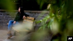 Ellen Lo Hoffman, co-founder of Soul Reparations, a nonprofit providing free spiritual support to women, poses for a portrait near her home, Aug. 21, 2024, in Bothell, Washington.