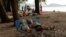 Russian tourists take a nap at Layan beach in Phuke
