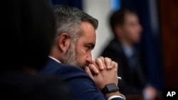 FILE - New Mexico Attorney General Raul Torrez listens to oral arguments dealing with local municipalities implementing ordinances restricting abortion, Dec. 13, 2023, in Santa Fe, NM. 