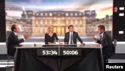 Francois Hollande (izquierda) y el presidente Nicolás Sarkozy (derecha), durante el debate de este miércoles por la noche.