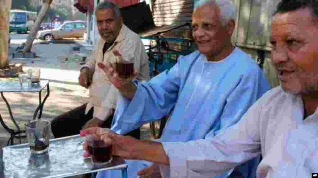 Voter turnout was light, but those who took part showed off their pink-stained fingers, proof of taking part. 