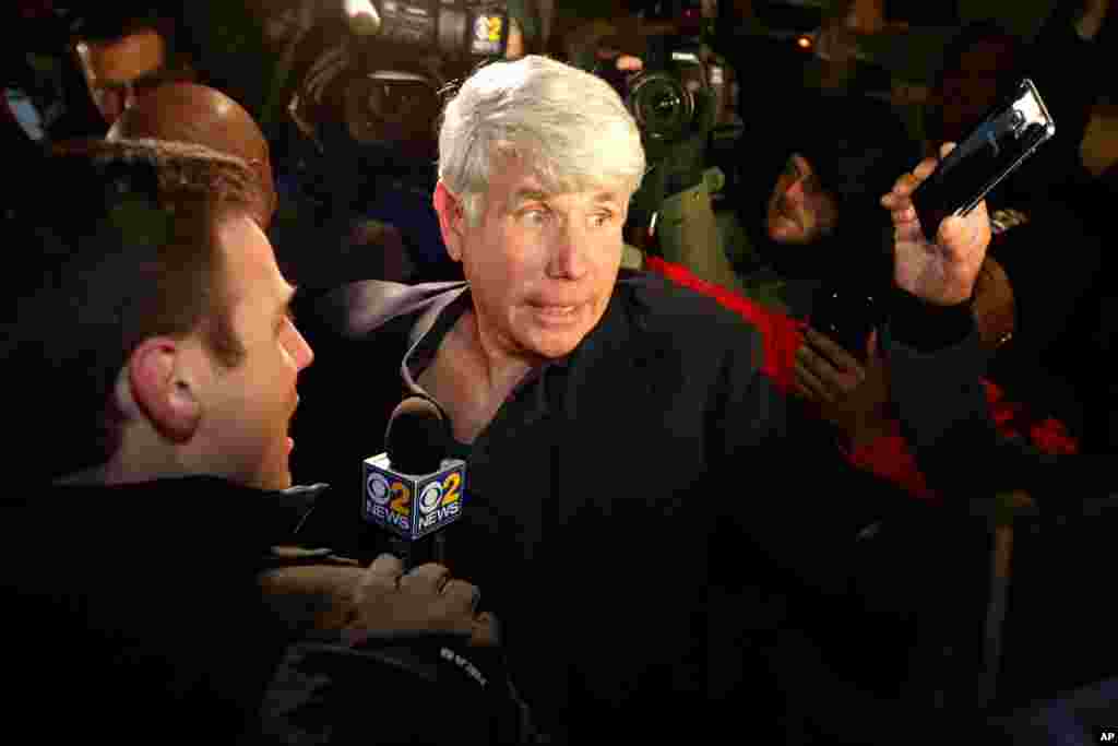 Former Illinois Gov. Rod Blagojevich enters his house in Chicago after his release from Colorado prison after President Donald Trump cut short the 14-year prison sentence handed to the former governor for political corruption.