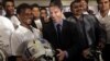 Chief Executive Officer of the Elite Football League India Richard Whelan (C) interacts with Indian players during a press conference to announce the league, in Mumbai, India, August 5, 2011.