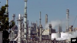 FILE: FILE - This July 6, 2006 file photo shows a representative illustration of an oil refinery in operation. 