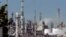 FILE: FILE - This July 6, 2006 file photo shows a representative illustration of an oil refinery in operation. 