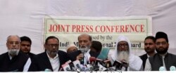 All India Muslim Personal Law Board members address a press conference after the Supreme Court ruling in New Delhi, Nov. 9, 2019. The dispute over land ownership has been one of the country's most contentious issues.