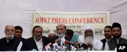 All India Muslim Personal Law Board members address a press conference after the Supreme Court ruling in New Delhi, Nov. 9, 2019. The dispute over land ownership has been one of the country's most contentious issues.