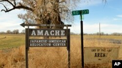FILE - This Jan. 18, 2015, file photo shows a sign at the entrance to Camp Amache, the site of a former World War II-era Japanese-American internment camp in Granada, Colo. 