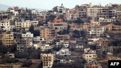 Reruntuhan di Khiam, Lebanon selatan, pasca-serangan Israel, 7 Desember 2024. Dua menteri Prancis tiba di Lebanon di tengah gencatan senjata rapuh antara Israel dan Hizbullah. (Foto: AFP)