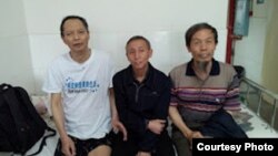 李旺陽(左)