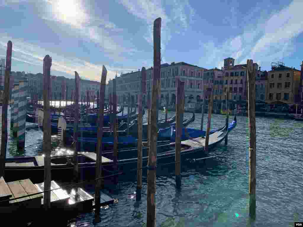 Gondolas along the Grand Canal, in Venice, Italy, Feb. 8, 2020.
