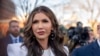 FILE - Homeland Security Secretary Kristi Noem speaks with reporters at the White House in Washington, Jan. 29, 2025. On Thursday, she cut the duration of deportation protections and work permits for 521,000 Haitians covered by the Temporary Protected Status program.