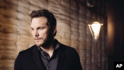 Actor Chris Pratt, shown at Universal Studios in Universal City, Calif., on June 6, 2015, says that to portray a raptor trainer in "Jurassic World," he embraced the "swagger" of the hero of one of Steven Spielberg's most recognizable films: rogue archeologist Indiana Jones.