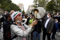 Bars and restaurants owners demonstrate agianst the closure orders due to COVID-19, in Marseille, southeastern France, on Oct. 2, 2020.