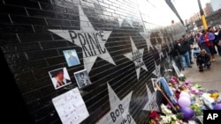 Prince's star adorns the wall at First Avenue as a memorial grew on April 21, 2016, in Minneapolis, where the pop super star Prince often performed. 