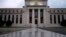 FILE - U.S. Federal Reserve building in Washington.