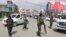 Les forces de sécurité afghanes après L'attentat-suicide, le 9 mars 2018 à Kaboul 