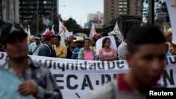 Farmers march to demand the resignation of Guatemala President Jimmy Morales and against the politicians involved with the Odebrecht bribery scheme, in Guatemala City, Guatemala, March 7, 2017. 