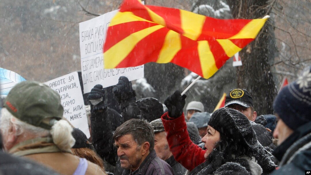 Opponents to the change of the country's constitutional name protest outside the parliament building prior to a session of the Macedonian Parliament in the capital Skopje, Jan. 9, 2019. 