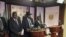 South Sudan President Salva Kiir (C), flanked by former rebel leader Riek Machar (L) and other government officials, addresses a news conference at the Presidential State House in Juba, South Sudan, July 8, 2016. 