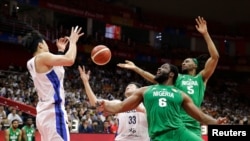 FILE - Nigeria's Ike Diogu competes in a FIBA World Cup, Sept. 4, 2019, against South Korea.