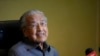 FILE - Former Malaysian Prime Minister Mahathir Mohamad speaks during a news conference at his office in Putrajaya, Malaysia, Jan. 22, 2024. 