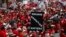 Thousands march to the Arizona Capitol for higher teacher pay and school funding in Phoenix, April 26, 2018.