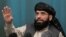 Dalam foto yang diambil pada 19 Maret 2021 ini, tampak juru bicara kelompok Taliban Suhail Shaheen berbicara dalam sebuah konferensi pers di Moskow, Russia. (Foto: AP)