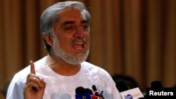 Afghan presidential candidate Abdullah Abdullah speaks during a news conference in Kabul, July 6, 2014. 