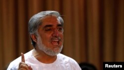 Kandidat presiden Afghanistan Abdullah Abdullah dalam konferensi pers di Kabul, 6 Juli 2014. 