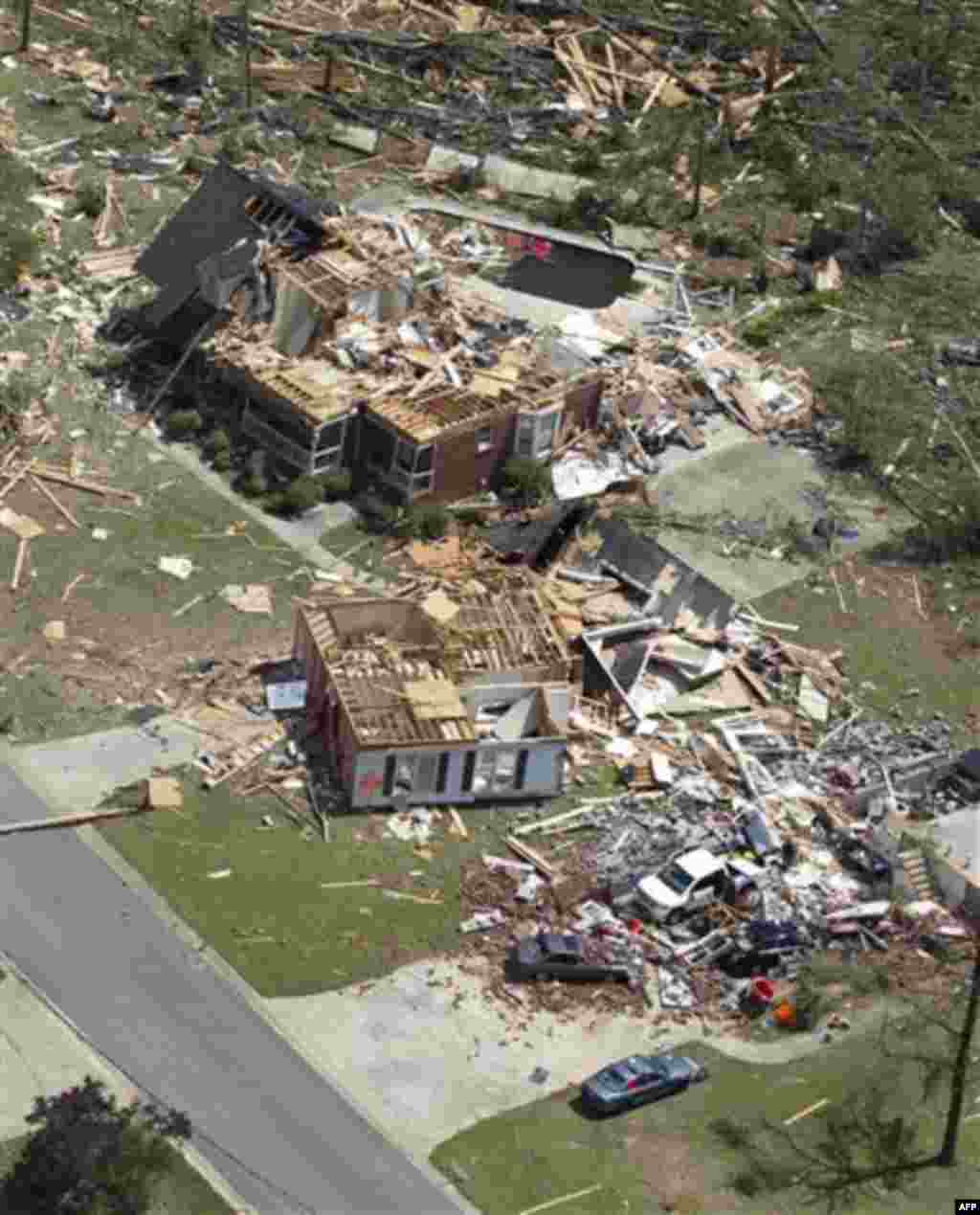 This is an aerial view of tornado damage in Pleasant Grove, Ala., Thursday, April 28, 2011. Massive tornadoes tore a town-flattening streak across the South, killing at least 266 people in six states and forcing rescuers to carry some survivors out on mak