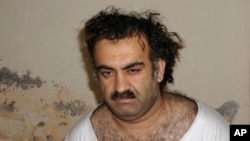 FILE - Khalid Sheikh Mohammed, the alleged Sept. 11 mastermind, is seen shortly after his capture during a raid in Pakistan on March 1, 2003. Sources said on Nov. 6, 2024, that a judge has ruled plea agreements by Mohammed and two others are valid.