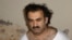 FILE - Khalid Sheikh Mohammed, the alleged Sept. 11 mastermind, is seen shortly after his capture during a raid in Pakistan on March 1, 2003. Sources said on Nov. 6, 2024, that a judge has ruled plea agreements by Mohammed and two others are valid.