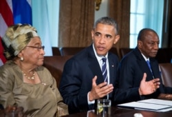 FILE - President Barack Obama, with Liberian President Ellen Johnson Sirleaf and Guinean President Alpha Condé, speaks at the White House in Washington, April 15, 2015, on progress made in the international Ebola response.