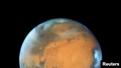 The planet Mars is shown May 12, 2016 in this NASA Hubble Space Telescope view when it was 50 million miles from Earth. 