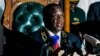 FILE: Zimbabwean President Emmerson Mnangagwa delivers his state of the nation address at a joint sitting of the parliament and the senate in Harare on December 20, 2017.