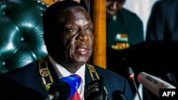 FILE: Zimbabwean President Emmerson Mnangagwa delivers his state of the nation address at a joint sitting of the parliament and the senate in Harare on December 20, 2017.