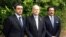 British Foreign Secretary William Hague (C), Emirati Foreign Minister Sheikh Abdullah bin Zayed al-Nahayan (L) and Pakistani Interior Minister Rehman Malik (R) posing for a picture during their visit to the Queen Elizabeth Hospital, where shot Pakistani schoolgirl Malala Yousafzai is receiving treatemnt, October 29, 2012. 