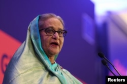 FILE - Bangladeshi Prime Minister Sheikh Hasina addresses the EU Global Gateway Forum 2023, in Brussels, Belgium, on Oct. 25, 2023.