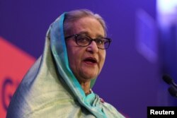 FILE - Bangladeshi Prime Minister Sheikh Hasina addresses the EU Global Gateway Forum 2023, in Brussels, Belgium, on Oct. 25, 2023.