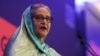 FILE - Bangladeshi Prime Minister Sheikh Hasina addresses the EU Global Gateway Forum 2023, in Brussels, Belgium, on Oct. 25, 2023. Russian media have repeatedly described the events that led to her resignation on August 5 as a U.S.-led color revolution. 