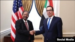 U.S. Treasury Secretary Steven Mnuchin (R) meets with Sudan's Prime Minister Abdalla Hamdok in Washington, December 3, 2019. (Twitter - @stevenmnuchin1)