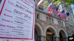 Emergency no parking signs are posted in front of the Trump International Hotel in Washington, June 28, 2017. 