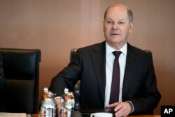 FILE—German Chancellor Olaf Scholz arrives for the weekly cabinet meeting at the chancellery in Berlin, Germany, April 10, 2024.